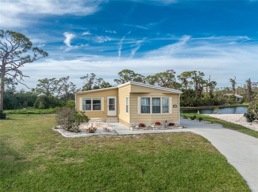 GREAT PRICE on this updated doublewide lakefront FULLY FURNISHED - Beach Home for sale in Englewood, Florida on Beachhouse.com