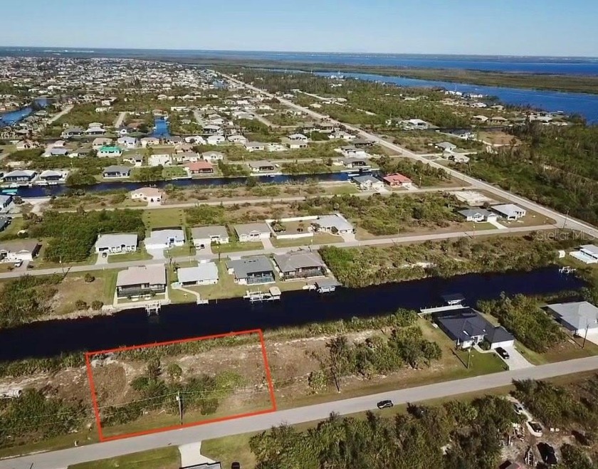 GULF ACCESS, WATERFRONT,  NEARLY 1/2 ACRE WITH QUICK ACCESS TO - Beach Lot for sale in Port Charlotte, Florida on Beachhouse.com