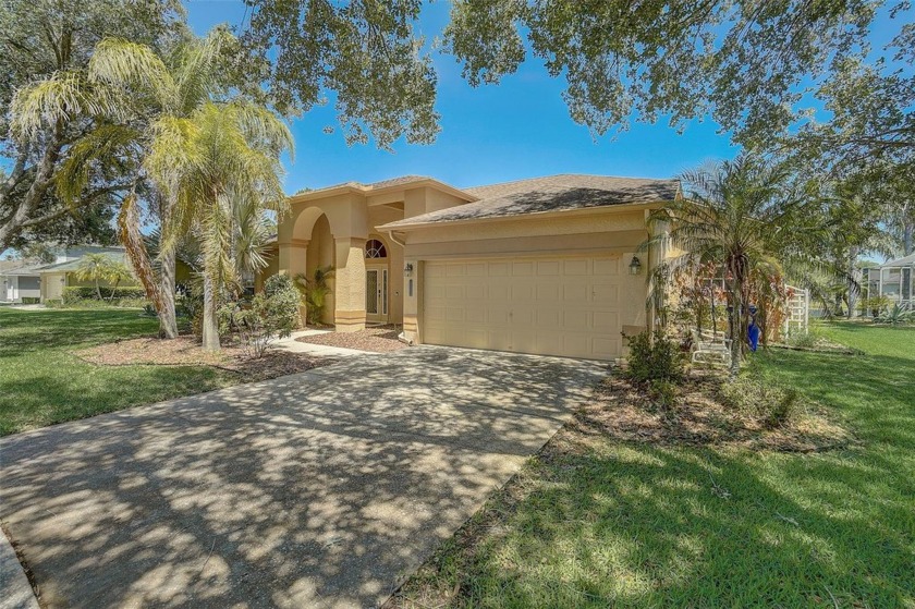 Beautiful 3 bedroom, 2 bath, pool home with exceptional pond - Beach Home for sale in Palm Harbor, Florida on Beachhouse.com