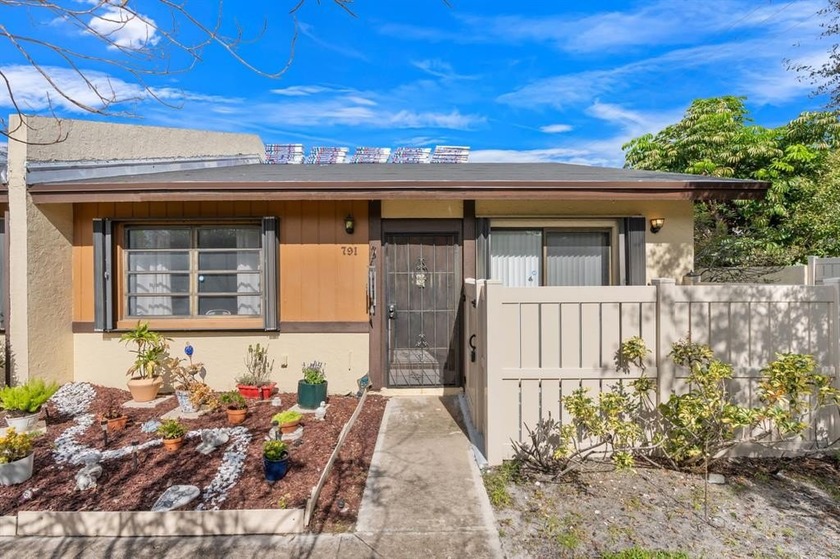 Welcome to this bright and inviting corner-unit villa, offering - Beach Condo for sale in Pompano Beach, Florida on Beachhouse.com