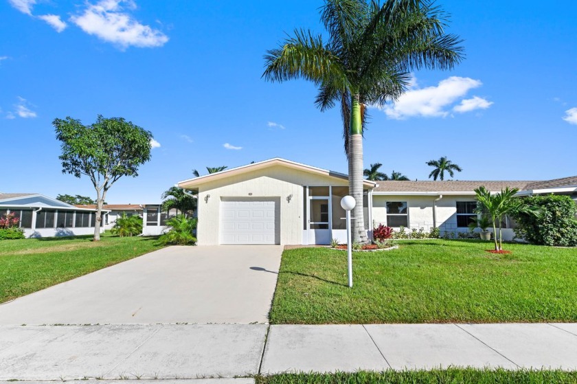 Presenting a meticulous residence at 6311 Dusenburg Road - Beach Home for sale in Delray Beach, Florida on Beachhouse.com