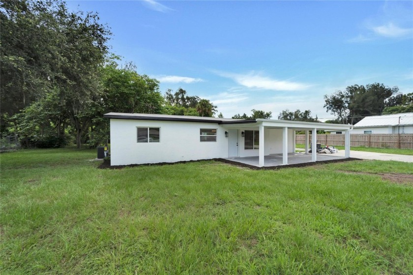 Step into comfort and style at 9920 Davis Street in this vibrant - Beach Home for sale in Gibsonton, Florida on Beachhouse.com