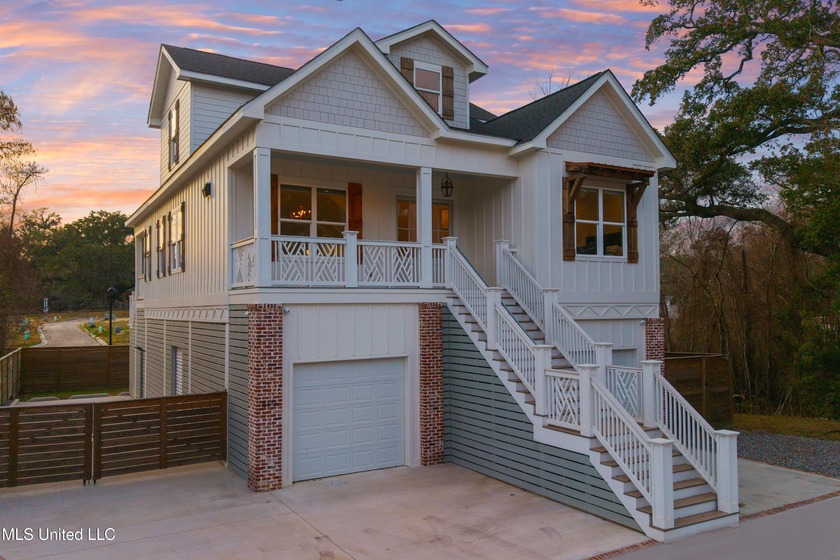 Welcome to a residence that perfectly captures the essence of - Beach Home for sale in Ocean Springs, Mississippi on Beachhouse.com