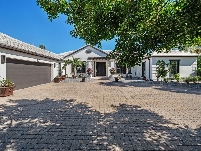 Situated in the highly coveted Bird Key neighborhood, The Banyan - Beach Home for sale in Sarasota, Florida on Beachhouse.com