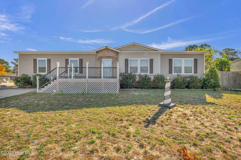 This well maintained coastal retreat is located just off River - Beach Home for sale in Wilmington, North Carolina on Beachhouse.com