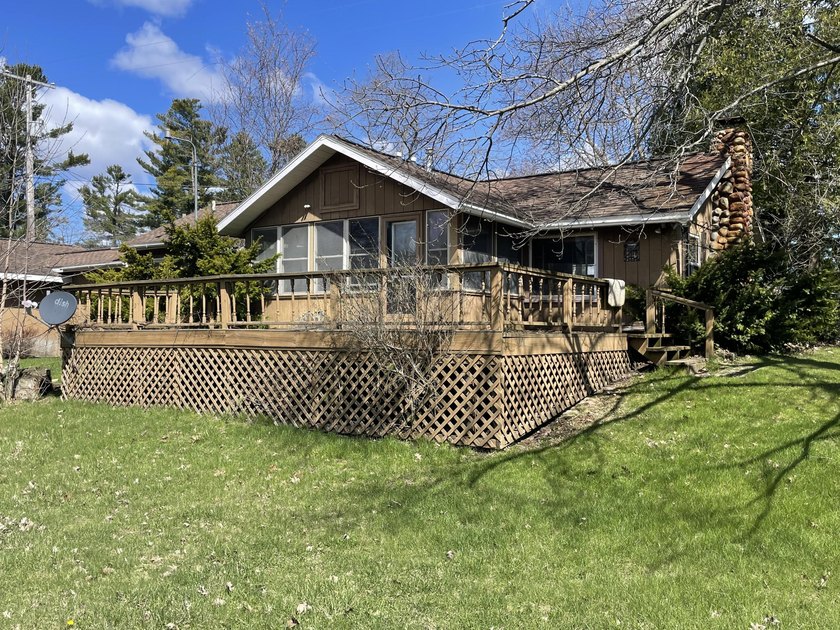 GREAT LOCATION!!!! Tucked away on Van Etten Creek, right at the - Beach Home for sale in Oscoda, Michigan on Beachhouse.com