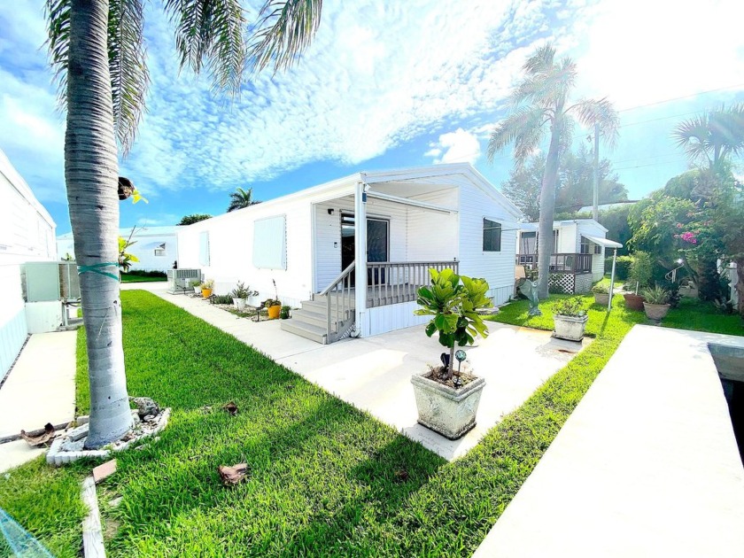 Don't miss out on this exceptional double wide unit on an - Beach Home for sale in Briny Breezes, Florida on Beachhouse.com