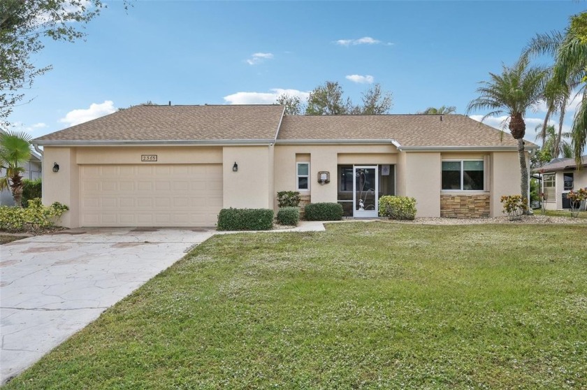 This beautifully updated 3 bedroom, 2 bathroom home, located in - Beach Home for sale in Punta Gorda, Florida on Beachhouse.com