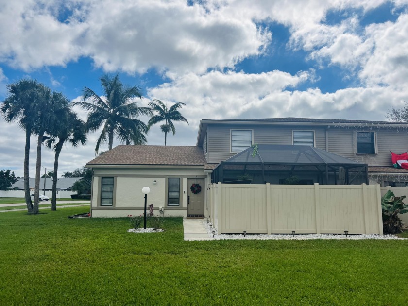 This charming 3-bedroom, 2.5-bathroom home requires no HOA - Beach Townhome/Townhouse for sale in West Palm Beach, Florida on Beachhouse.com