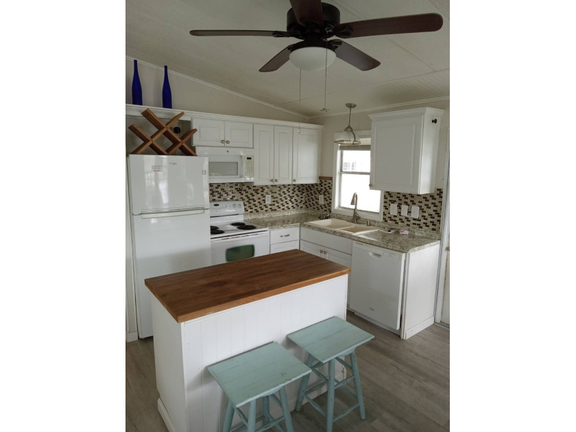 Beautiful cozy waterfront home in Village green Community.  This - Beach Home for sale in Vero Beach, Florida on Beachhouse.com