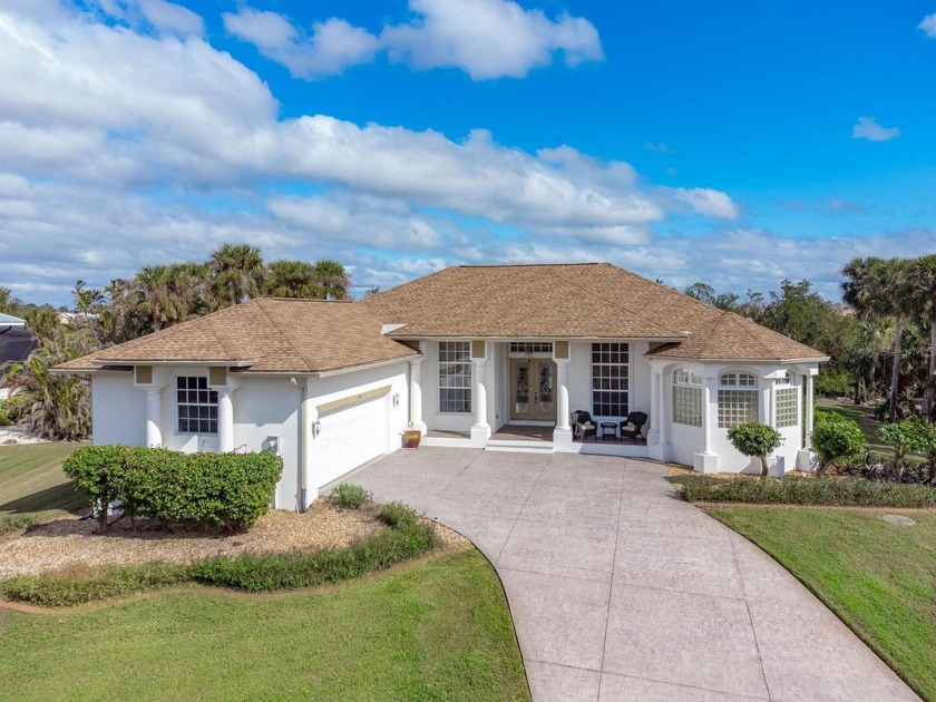 This TURN-KEY FURNISHED, custom-built pool home by Newport Homes - Beach Home for sale in Placida, Florida on Beachhouse.com