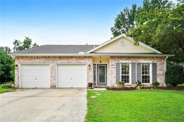 This well-maintained 3-bedroom, 2-bath home sits on a quiet - Beach Home for sale in Mandeville, Louisiana on Beachhouse.com