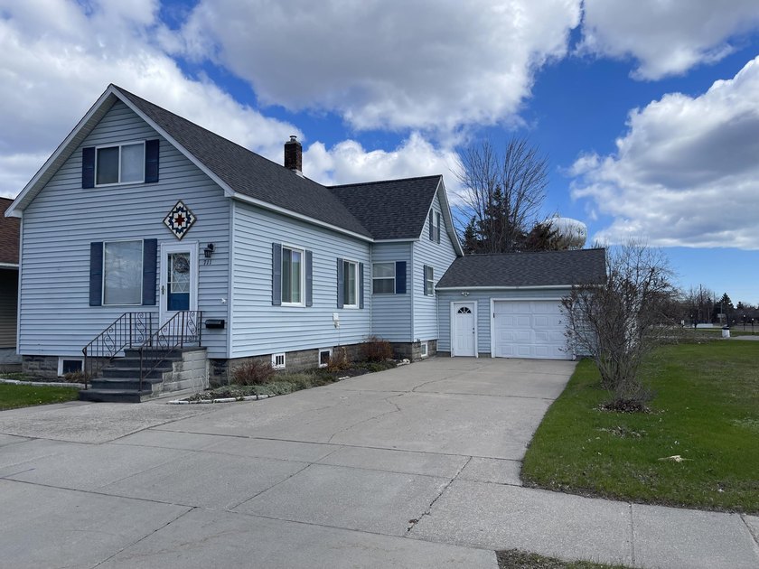 This 3 bed, 2 bath home is located in the heart of the City of - Beach Home for sale in Alpena, Michigan on Beachhouse.com