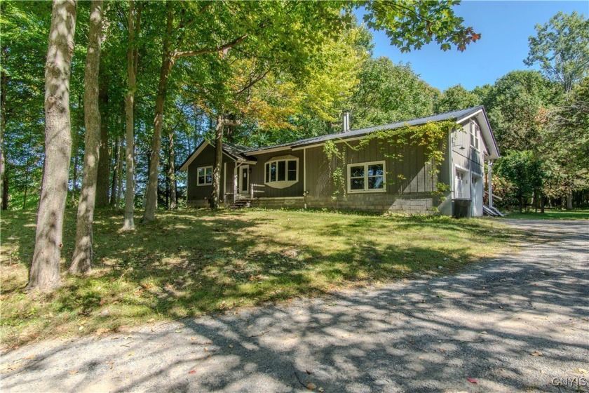 Built in 1975, this well-maintained ranch-style home blends - Beach Home for sale in Sackets Harbor, New York on Beachhouse.com