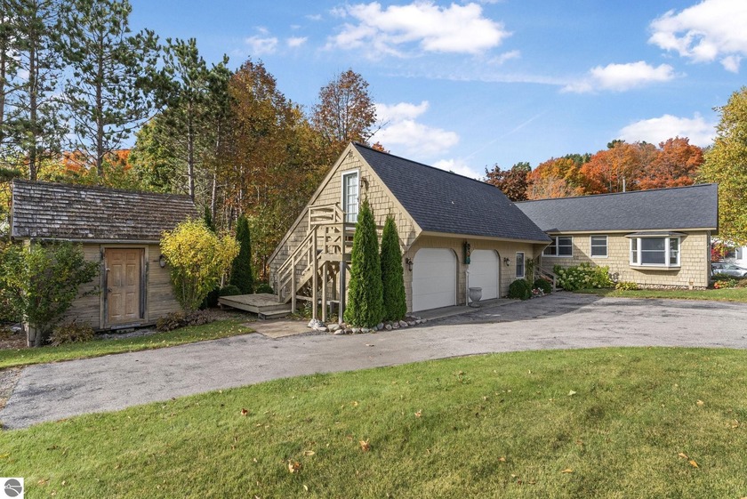 Location, lifestyle, and charm! Moments from hiking trails - Beach Home for sale in Northport, Michigan on Beachhouse.com