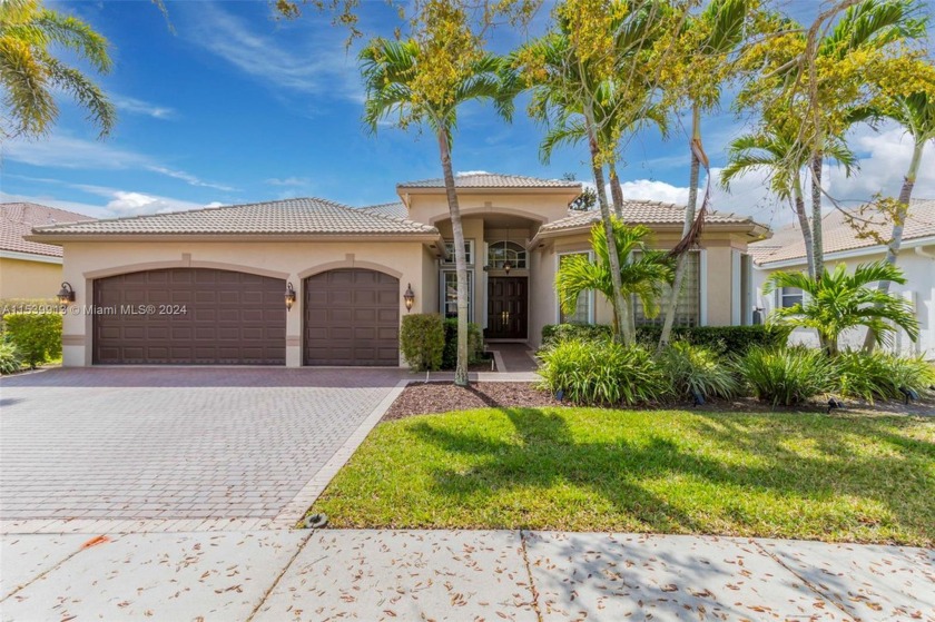Impeccable one story home with wide lake views in the resort - Beach Home for sale in Miramar, Florida on Beachhouse.com