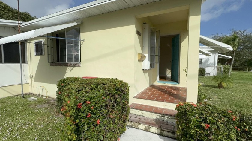 Charming 2-bedroom, 1-bathroom home nestled in the heart of Lake - Beach Home for sale in Lake Worth Beach, Florida on Beachhouse.com