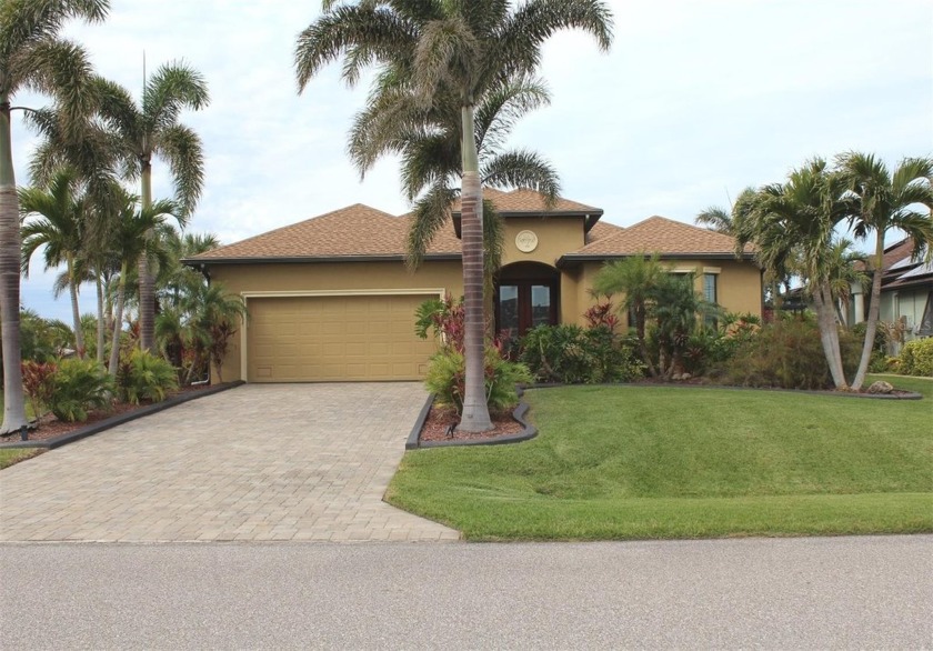 Nestled on a premium lakefront lot, this exquisite residence - Beach Home for sale in Rotonda West, Florida on Beachhouse.com