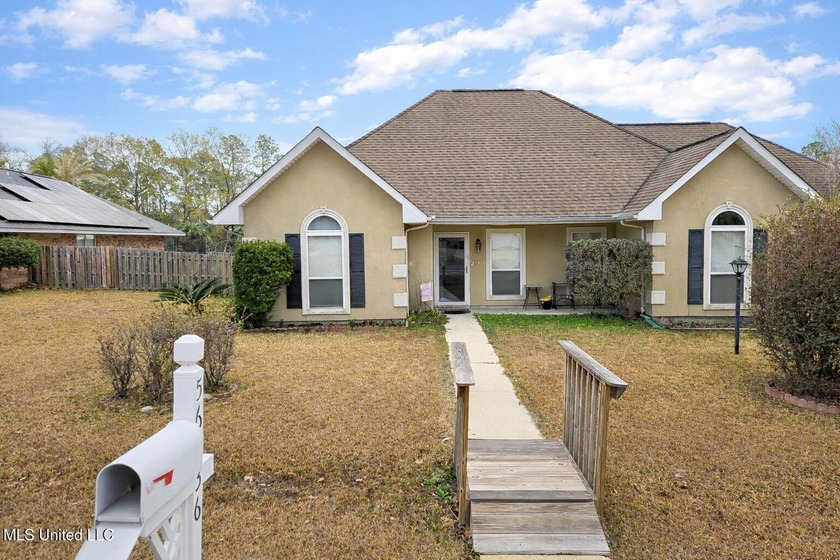 Welcome to 56136 Diamondhead Dr E in the heart of Diamondhead - Beach Home for sale in Diamondhead, Mississippi on Beachhouse.com