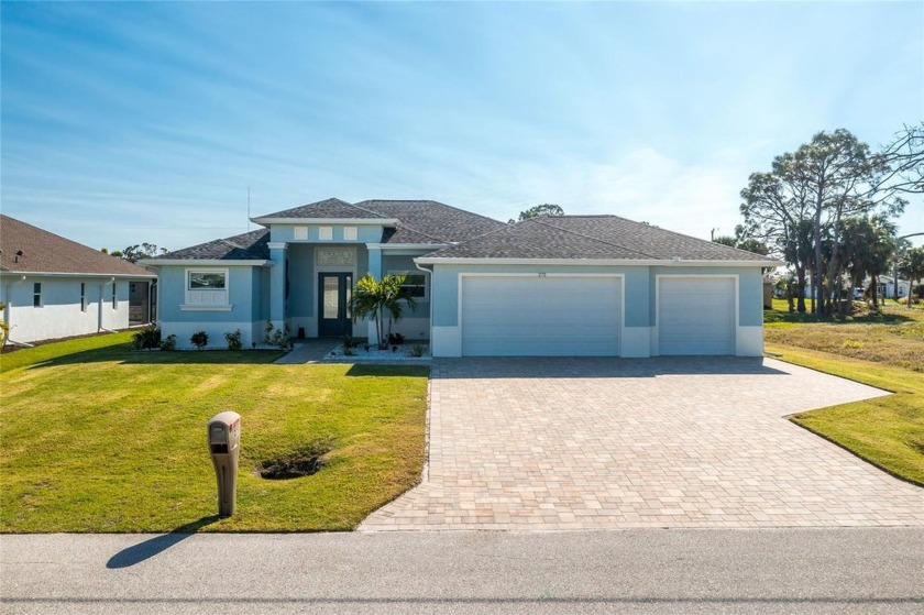 Discover this exceptional 3-bedroom, 2-bath 3-car garage pool - Beach Home for sale in Rotonda West, Florida on Beachhouse.com