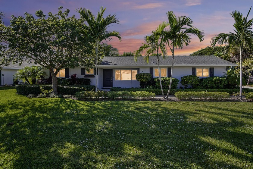 Location! Charming CBS 3 bedroom, two bath home in a quiet - Beach Home for sale in Jupiter, Florida on Beachhouse.com