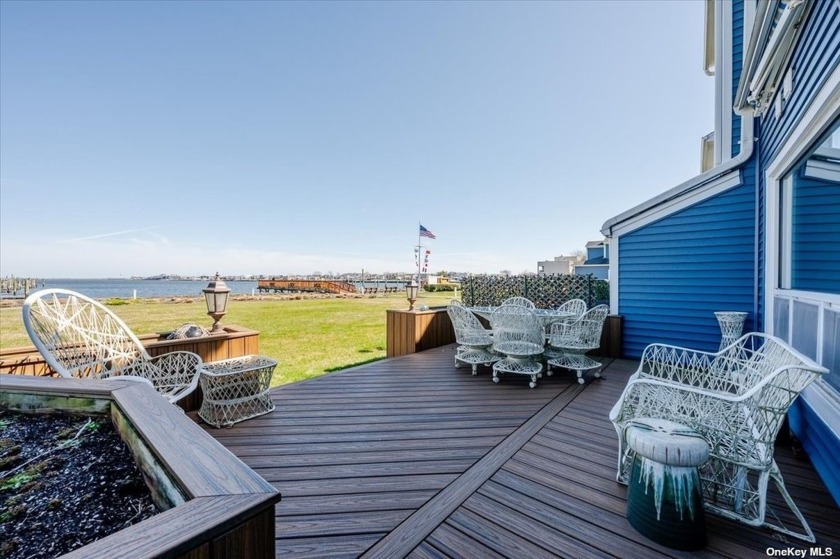 Wake up to the sunrise from the unobstructed bay views of this - Beach Townhome/Townhouse for sale in Island Park, New York on Beachhouse.com