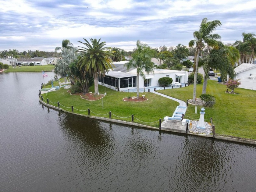 CASH ONLY! LOCATION LOCATION LOCATION! 130 feet of waterfront at - Beach Home for sale in Holiday, Florida on Beachhouse.com