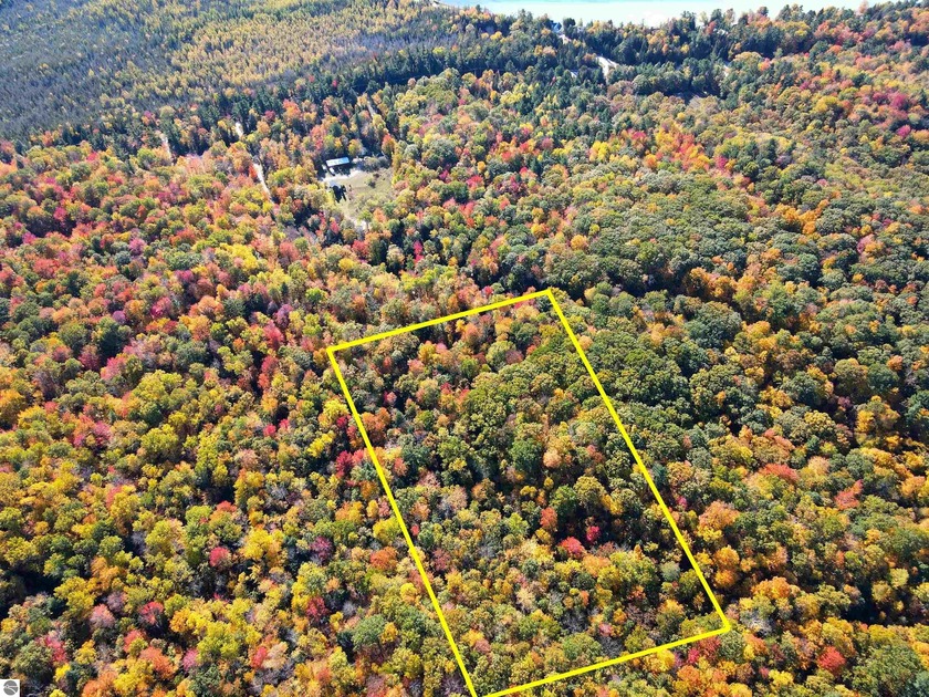 Discover your own private retreat on this beautiful 6-acre - Beach Acreage for sale in Leland, Michigan on Beachhouse.com