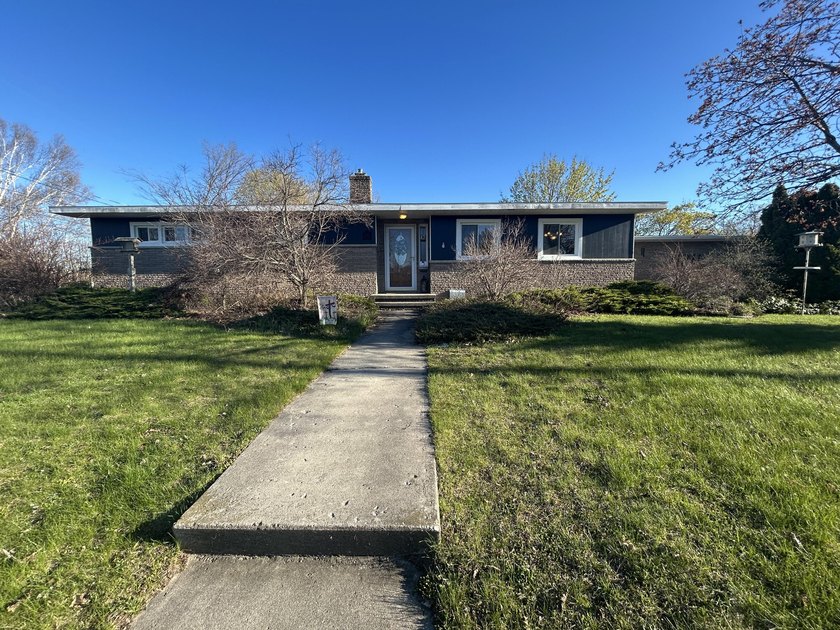 Discover the perfect blend of comfort and convenience in this - Beach Home for sale in Alpena, Michigan on Beachhouse.com