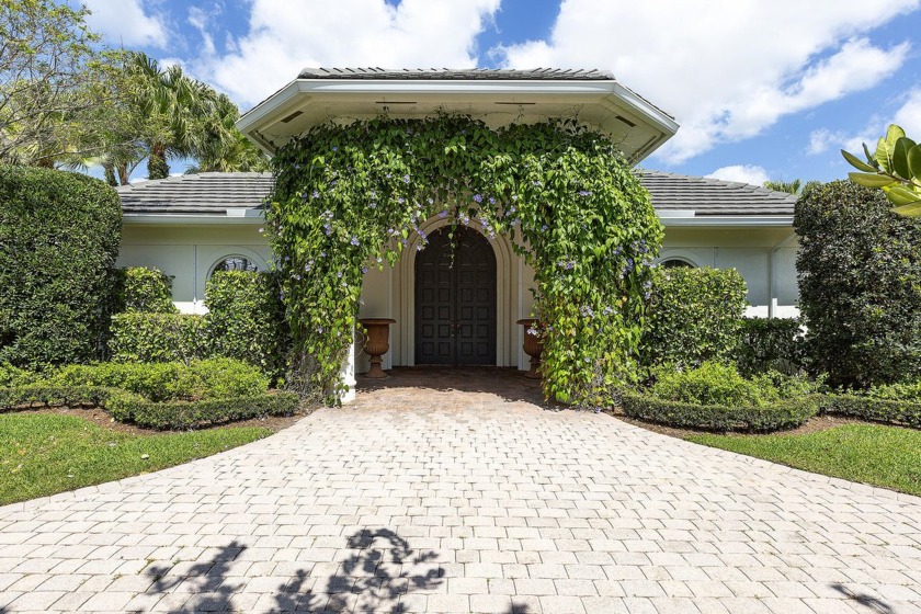 This beautiful courtyard home features four bedrooms - Beach Home for sale in Wellington, Florida on Beachhouse.com