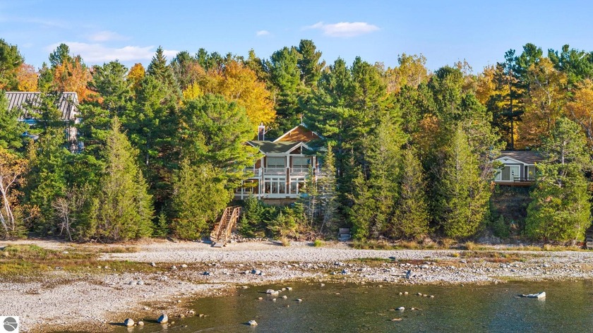 Experience iconic Lake Michigan living just 10 minutes from - Beach Home for sale in Charlevoix, Michigan on Beachhouse.com
