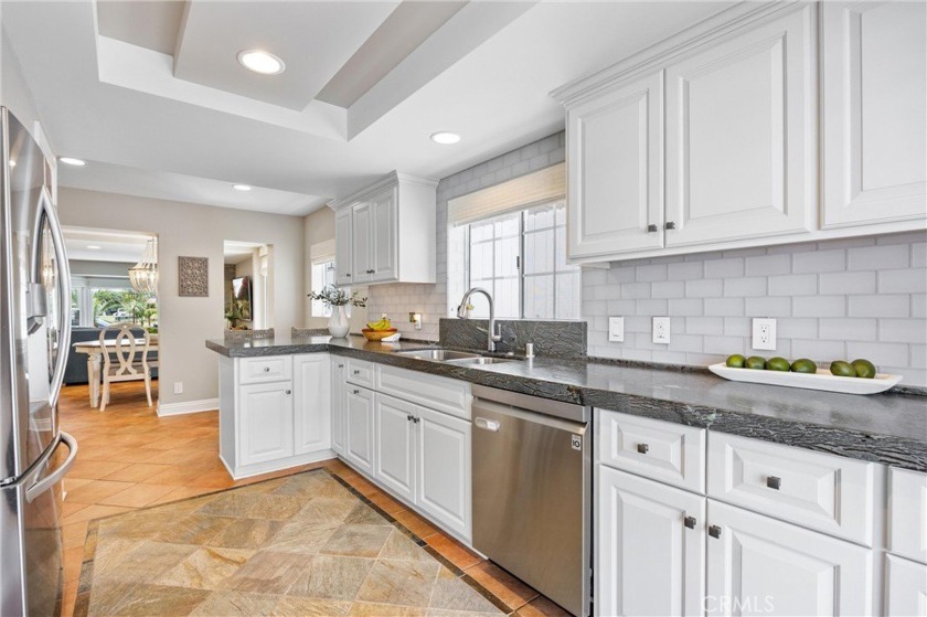 This darling Cape Cod Beach Cottage is only TWO STORIES, offers - Beach Home for sale in Huntington Beach, California on Beachhouse.com