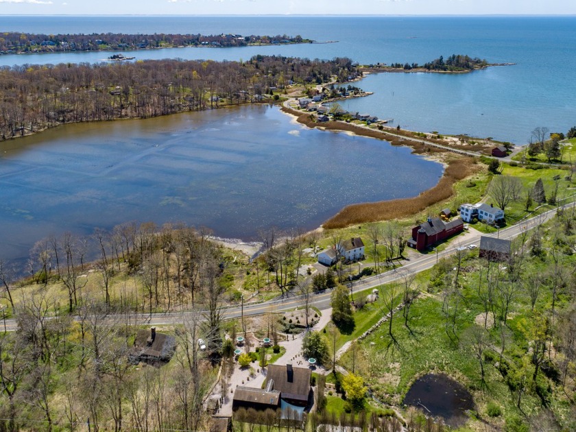 Perched atop a gentle rise overlooking Shell Beach lagoon across - Beach Home for sale in Guilford, Connecticut on Beachhouse.com