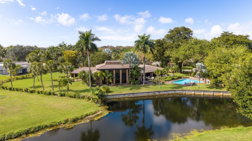 Welcome to 5300 White Oak Lane, a one-story estate w/ Canal - Beach Home for sale in Tamarac, Florida on Beachhouse.com