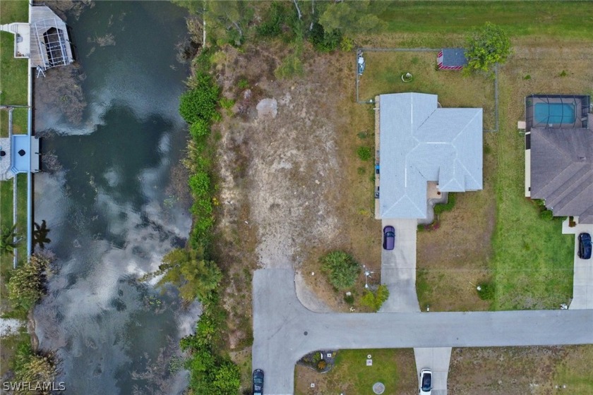 THE NEXT BEST THING TO GULF ACCESS!!! FRESHWATER LOT CONNECTING - Beach Lot for sale in Cape Coral, Florida on Beachhouse.com