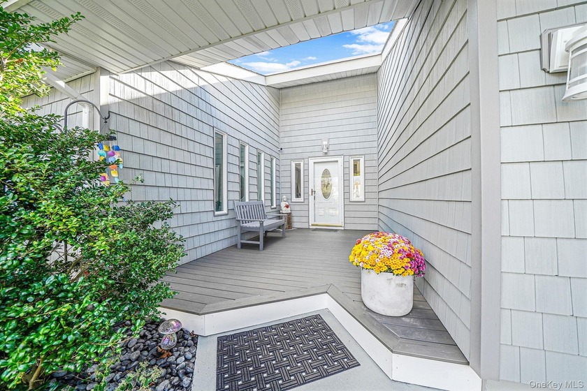 Tucked away in a peaceful Bellport neighborhood, this - Beach Home for sale in Bellport, New York on Beachhouse.com