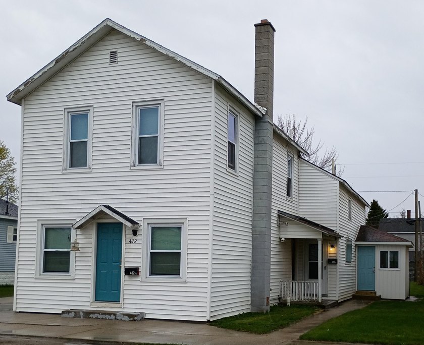 Four units with great rental income! Convenient location - - Beach Home for sale in Alpena, Michigan on Beachhouse.com