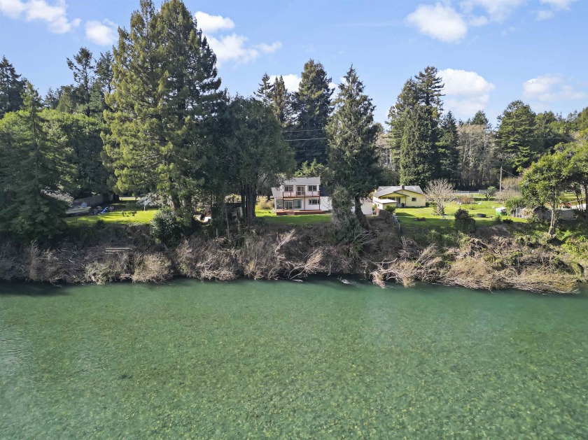 Welcome to your riverfront oasis on .67 acres. Enjoy the sleek - Beach Home for sale in Crescent City, California on Beachhouse.com