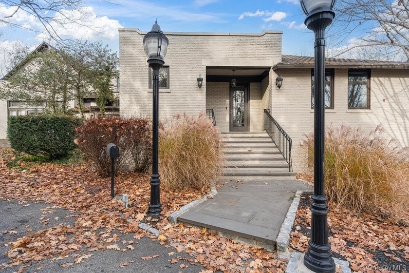 Located on a high bluff overlooking the Long Island Sound, this - Beach Home for sale in Glen Cove, New York on Beachhouse.com