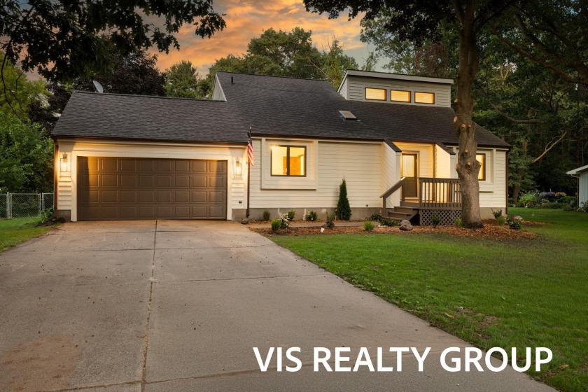 Move right into this beautifully updated 3-bedroom, 2-bath home - Beach Home for sale in Spring Lake, Michigan on Beachhouse.com