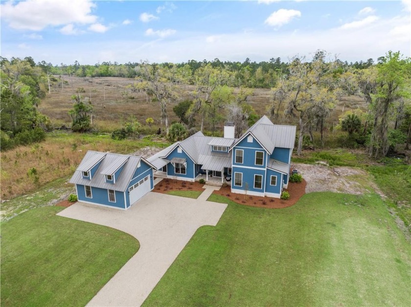 Welcome to this exceptional new construction home situated on - Beach Home for sale in Brunswick, Georgia on Beachhouse.com