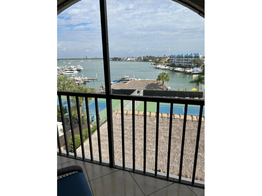 This unit checks all the boxes. Top floor, big bay views, new - Beach Condo for sale in Marco Island, Florida on Beachhouse.com
