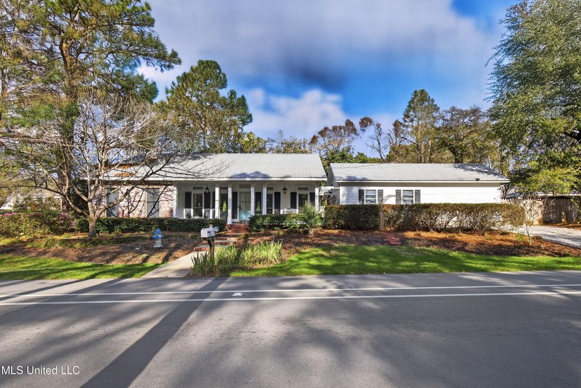 TWO RESIDENCIES FOR THE PRICE OF ONE!! FIRST A BEAUTIFULLY - Beach Home for sale in Diamondhead, Mississippi on Beachhouse.com