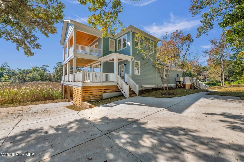 Experience waterfront living at its finest with this completely - Beach Home for sale in Wilmington, North Carolina on Beachhouse.com