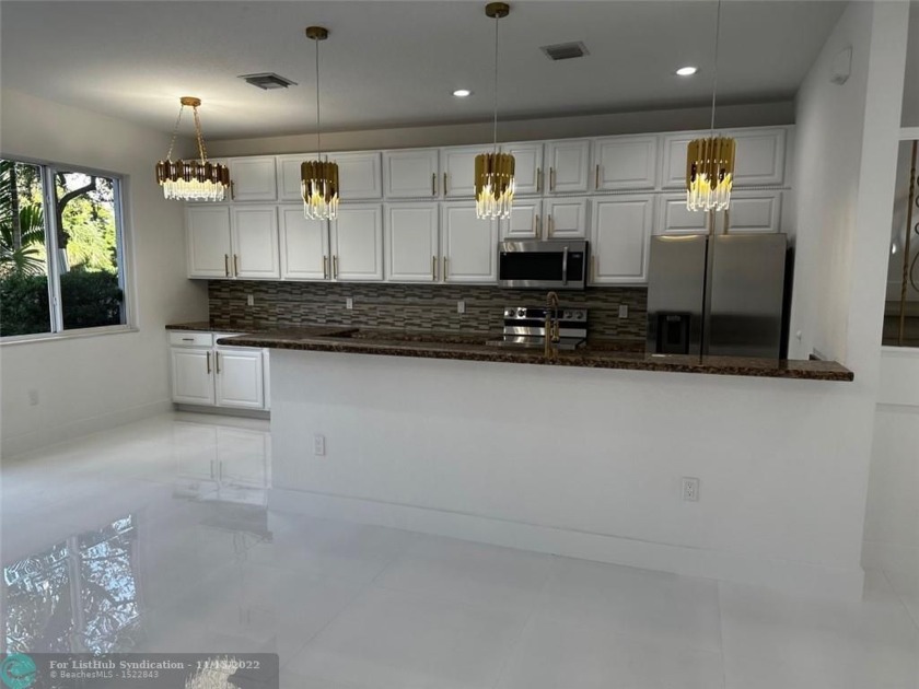 Gorgeous remodel, just finished July 2022.  24x24 white - Beach Townhome/Townhouse for sale in Pompano Beach, Florida on Beachhouse.com