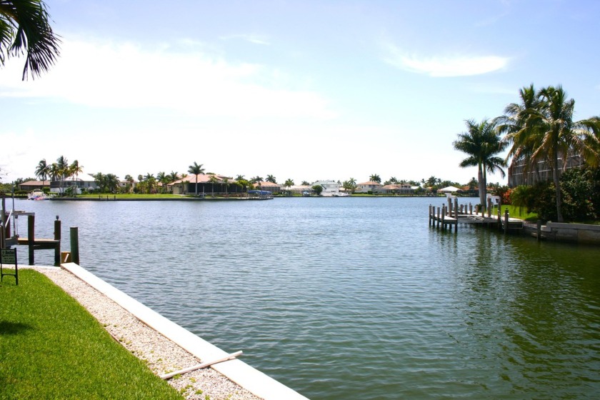 PRICED TO SELL AT LOT VALUE, WIDE AND LONG WATER VIEWS, SOUTHERN - Beach Home for sale in Marco Island, Florida on Beachhouse.com