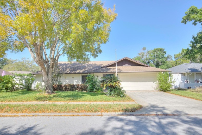 Welcome to this well-maintained block home, boasting three - Beach Home for sale in St. Petersburg, Florida on Beachhouse.com