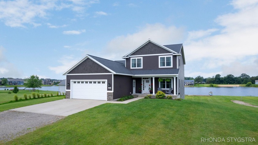 Welcome home to this inviting, 6 bedroom, 5 bath home on a - Beach Home for sale in West Olive, Michigan on Beachhouse.com