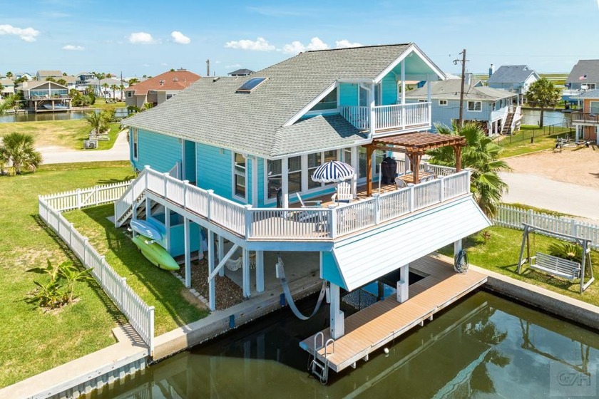 This stunning 3/2 canal home embodies the ultimate waterfront - Beach Home for sale in Jamaica Beach, Texas on Beachhouse.com