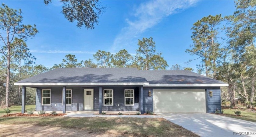 Welcome HOME to this 2024 stunning farmhouse-style home nestled - Beach Home for sale in Crystal River, Florida on Beachhouse.com